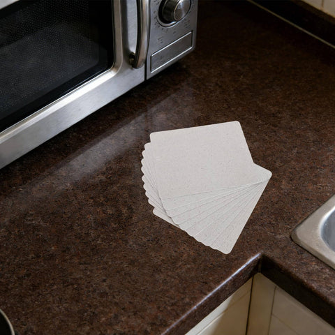 Mica Insulation Sheet 10 Pack For Microwave And Oven Repair Heat Resistant Fireproof Dielectric Board on kitchen counter