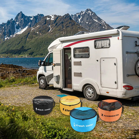 4 Pack RV Hose Storage Bags With Visible Cover And Two Way Zipper, Waterproof Utility Organizer For Fresh Water Hoses Black Water Hoses Electrical Cords And Camper Tools in front of a camper with mountains in the background.