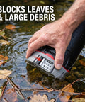Heavy Duty Submersible Water Pump With 4600 GPH Flow Rate And Built In Filter Base for quick drainage, shown blocking leaves and debris.