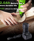 Straight Up Powerhouse 12V Cordless Rotary Tool With Keyless Chuck And Flex Shaft, 6 Speed Grinder Hits Up To 32000Rpm, 119 Piece Accessory Kit For Wood Carving And Cutting, Includes Solid Battery And Charger, showing 12V lithium-ion battery and tool drilling into wood.