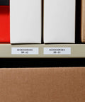 All Weather Vinyl Label Tape Built To Handle Heavy Duty Work And Lab Marking Sticks Like Wild In Freezers Or Extreme Cold Black On White Tape on labeled storage boxes.