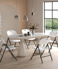 Dining area with Built Tough 350 Pound Weight Capacity Plastic Folding Chair With Reinforced Steel Frame For Indoor And Outdoor Use