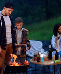 Two In One Mini Lantern And Flashlight Zoomable Portable Light on table at camping barbecue with family