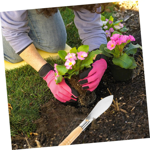 Ergonomic Hand Shovel for Gardening, No-Fuss Grip, Dig Deep Spade, plant transplanting next to blooming flowers