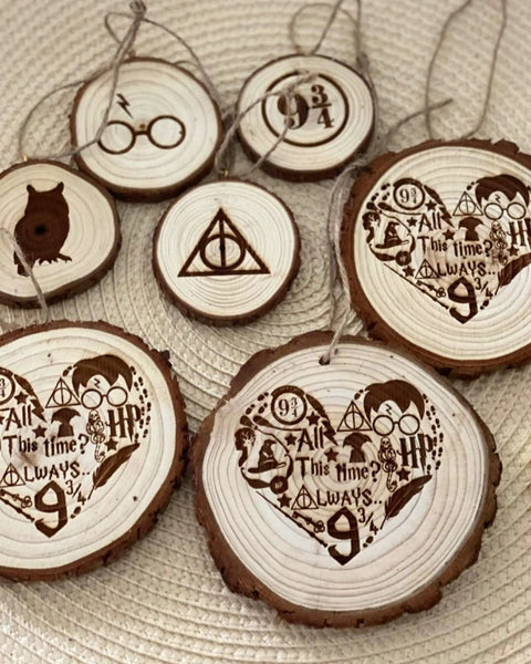 Wood Slices 30 Pcs Predrilled Round Discs 3.5-4 Inches Unfinished Rustic Craft Kit With Bark For DIY Projects, Home Decor And Christmas Ornaments featuring engraved designs and symbols, laid on a woven surface.