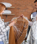 Two people using 20 Pack Clear Garment Bags For Hanging Clothes Plastic Dry Cleaner Bags With Dustproof Covers Transparent Clothes Covers For Travel Home Storage And Dry Cleaning 60x90cm
