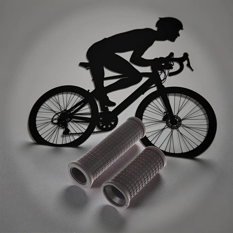 Dual Length Black Bike Handlebar Grips For Twisting Shifters with a silhouette of a cyclist in the background