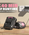 Cordless 20V Leaf Blower With Two 2.0Ah Batteries And Charger Included on a table with pink accents