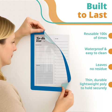 Person using 8.5 By 11 Inch Peel And Stick Adhesive Wall Frames Pack Of 5 In Blue, featuring a reusable to-do list