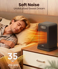 Indoor Space Heater With Remote Control 1500W Desk Heater For Office And Home on bedside table emitting warm air