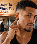 Man wearing 54 Piece Ear Gauge Stretching Kit For Beginners And Newbies With Jojoba Oil 14G to 12mm starter set in gym