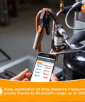 Technician using HVAC In-Pipe Temperature Probe With Bluetooth App, Clamp Meter For Heating And Cooling Systems, Precise Readings