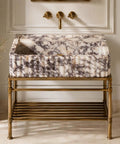 Calacatta Viola Marble Apron Sink, Hand-Carved Fluted Bathroom Washbasin on a metal stand, elegant design, rectangular structure.