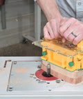 Killer Table Saw 3D Grip Pushblock With Dead Solid Kickback Stopping Guard And Sliding Blade Shield Super Smooth Workpiece Stabilizer in use.