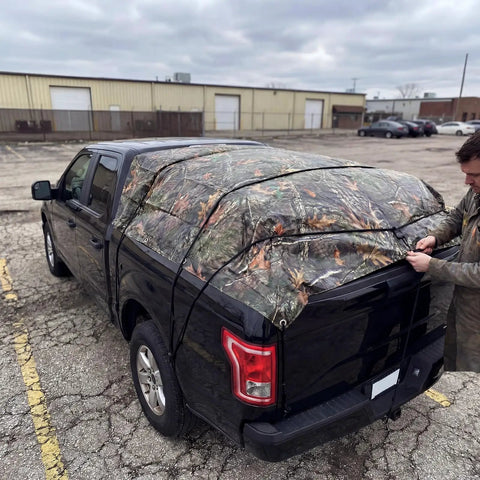No Nonsense Tough 9 Mil Tarp Cover Waterproof UV Resistant Tarpaulin for Outdoor Use on truck, camo design, secured with straps