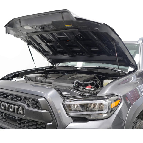 Hood Quicklift Plus System for Toyota Tacoma 2016 2023 installed, showing open hood with prop rod eliminator kit