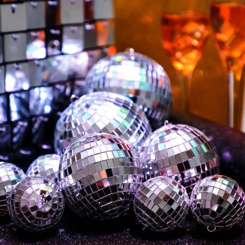 Close-up of 100 Piece Mirror Disco Balls Set Dope Party Decor Bulk Assorted Silver Hanging Decor For Home Parties Weddings Dance Floors