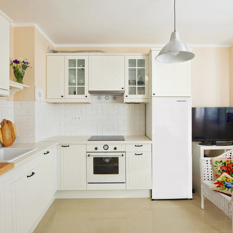 Sleek Upright Convertible Refrigerator And Freezer Serving 6.8 Cu Ft Of Flex Storage in a modern kitchen with white cabinets.