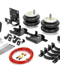 TORQUE rear airbag suspension kit with two air springs, black mounting brackets, and red air line.