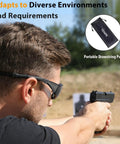 Man wearing Snag These Hella Clear Anti Fog Safety Glasses With Thick Foam Cushion and Secure Strap while aiming a gun.