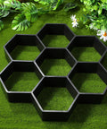 Hexagonal Concrete Molds For Walkways And Pavers DIY Cement Forms on grass, black plastic hexagonal design for outdoor pathways