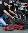 Mechanic using Heavy Duty 450 Piece Drive Socket Set With Quick Release Ratchet Wrench Includes Half Inch Quarter Inch And Three Eighths Inch Drives