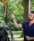 Man using One Quarter Inch Medium Duty Tie Down System With Fifteen Foot Rope Weather Resistant 150 Lbs Working Load Jam Cleat