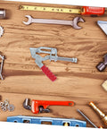 Four Piece Push Pull Toggle Clamps Set For Woodworking And Metal Workholding on wooden table with various tools