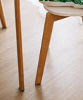Non Slip Rubber Feet Pads For Furniture Legs, 20-Piece Set shown on wooden chair, prevent sliding and protect floors.