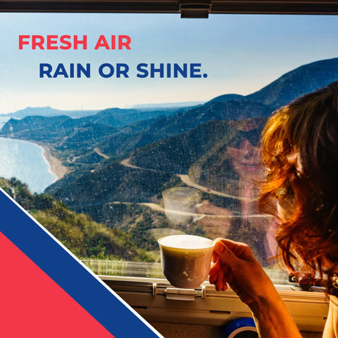 Person holding coffee cup by window with mountain and coastal view, text reads 'Fresh Air Rain or Shine'.