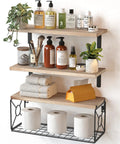 Top Tier Set Of 3 Floating Bathroom Shelves With Wire Storage Basket Crafted From Solid Natural Paulownia Wood For Durable Wall Mounted Decor And Big Time Clutter Relief, displaying toiletries and towels.