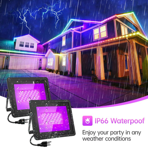 2 Pack 100W IP66 Waterproof Black Light Flood Lights With Plug And 6 Foot Cable illuminating a house in the rain