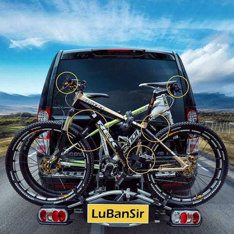 Van with 8 Pack Bike Rack Straps With Adjustable Stabilizers securing two mountain bikes during transport on a vehicle rack.
