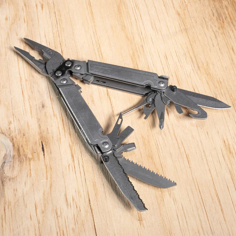 PowerAccess Assist Full Sized Daily Use Multi Tool One Handed Assisted Opening 21 Tools on wooden surface.