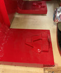Close-up view of Economical Heavy Duty Hydraulic Machinery And Equipment Mover with Adjustable Forks, red mounting pegs visible.