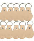 Fresh Veg Tan Leather Key Fobs In A Ten Pack With Pre Assembled Hardware showing ten keyfobs with attached metal rings.