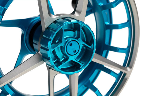 Close-up of Litespeed M Fly Reel For Saltwater Big Game Ultramarine Finish Ultra Lightweight CNC Machined Frame Super Large Arbor.