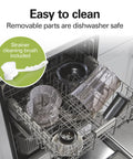 Juicer parts set in an open dishwasher (front view) including strainers and a cleaning brush.