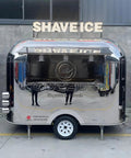 Built Different Stainless Steel Food Truck With Fully Loaded Commercial Kitchen Sleek Custom Mobile Concession Trailer, shiny exterior with SHAVE ICE sign.