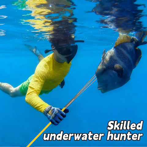 Diver using Hawaiian Sling 7ft Beefy Fiberglass Pole Spear for spearfishing underwater, catching fish, wearing snorkel gear