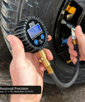 JACO ElitePro digital tire pressure gauge on tire valve; black ribbed body, brass nozzle, blue display