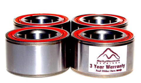 Angled top-down view of four metal wheel bearings with red seals; Rocky Mountain Bearings label visible.