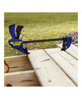 One-Handed Quick-Change Bar Clamp For Medium-Duty Projects, 12 Inch, 300 Lbs Clamping Pressure, I-Beam Design in use on deck boards