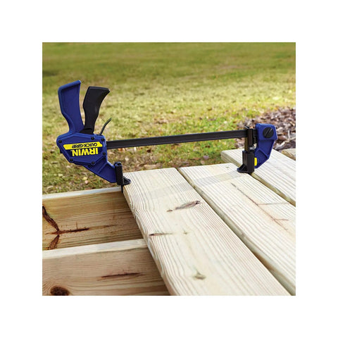 One-Handed Quick-Change Bar Clamp For Medium-Duty Projects, 12 Inch, 300 Lbs Clamping Pressure, I-Beam Design in use on deck boards