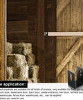 Heavy Duty U Shaped Door Barricade Bracket For 2x4 Openings installed on barn wall with black finish brackets visible