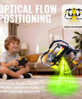 Boy playing with Mini Indoor Micro Drone For Kids With Cool LED Lights And 3 Speed Modes in living room