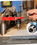 Person using a wrench to adjust a top-mounted ball bearing router bit guide kit for woodworking on a milling machine.