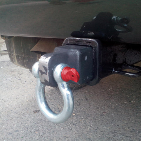 Two Pack 1 Inch D Ring Shackles Heavy Duty Bow Shackles With Screw Pin Eight And A Half Ton Working Load Limit Tow Shackles For Towing Rigging Winch Recovery For Tough Jobs attached to a vehicle hitch