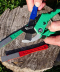Using DiaSharp Diamond Mini Hone Sharpening Kit With Coarse Fine And Extra Fine Grit Stones for garden tool edge restoration on a log.