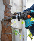 1-1/4 Inch SDS-Plus Rotary Hammer Drill in use for masonry work, showing vibration control and safety clutch features.
